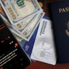 Smartphone Cash Credit Cards and Passport